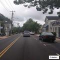 Truck crashes into parked vehicle on Main Street