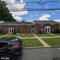 Person having difficulty breathing in apartment