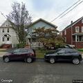 Car parked in handicap spot at Cedar Street