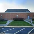 Homeless man found wrapped in blanket at library parking lot