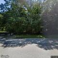 Complaint about loitering and shopping carts in woods