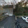 Tree blocks driveway and stairs on Oakdale Road