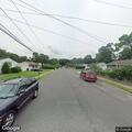 Woman with breathing difficulty near Quaker Lane
