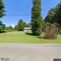 Brush fire from trash pile on Piper Road