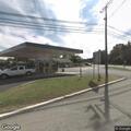 Disabled sedan blocking Route 46 near gas station