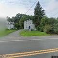 Side door found open at bank near west main street