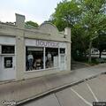 Person arrested on warrant outside boutique