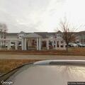 Unresponsive elderly woman breathing at Aspen Park entrance