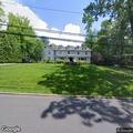 Tree on power lines with visible flames in Tenafly