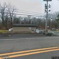 Tree on power line causing small fire over road