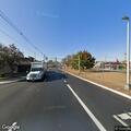 Poles down and live wires block E 34th and McLean
