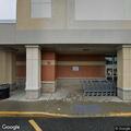 Distressed pregnant woman and child at store entrance