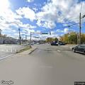 Poles down with live wires near vehicle on River Street
