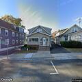 Person experiencing back pain near Prospect Park
