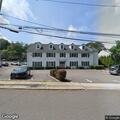 Overturned vehicle crash at Main Street parking lot