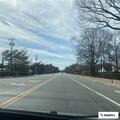 Disabled SUV off roadway on Route 25A