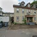 Woman having trouble breathing on porch fire