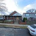 Sick person reported outside on porch at Kenmore Street