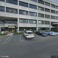 Possible fuel spill in pond near parking garage