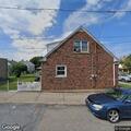 Vehicle backs into garage at Grant Street home