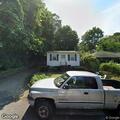 Man using cocaine with syringe at Sound Beach home