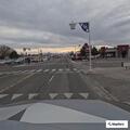 Suspicious white pickup leaves business entrance