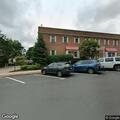 Vehicle crash reported near building on South Walnut