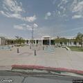 Aggressive man throwing items at courthouse platform