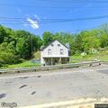 Person experiencing chest pain near Main Street in Andover