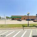 Woman having difficulty breathing in pharmacy parking lot