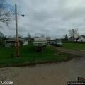 Abandoned camper reported in front of residence