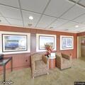 female with abdominal pain at hotel lobby
