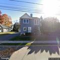 Unknown vehicle reported in driveway on Aqueduct Ave