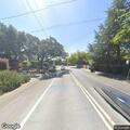 Traffic backup from stalled vehicle at red light