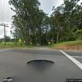 Downed stop sign creating traffic hazard