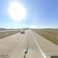 Semi stuck in median causes traffic hazard