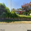 Tree branch partially blocking Roosevelt Avenue