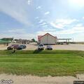 Minor crash between two trucks at gas station