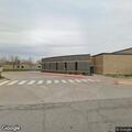 Man falls off scooter at high school parking lot