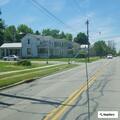 Men knocking on door on US 13 near Bangorville