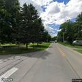 Unresponsive woman found on vehicle rear, possible overdose