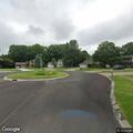 Dumpster creating road hazard on Park Meadows Court