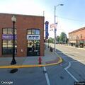 Loose black dog reported near Akron pharmacy