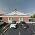 Private-lot crash at bank on High Street