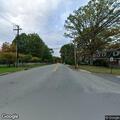 Vehicle struck by fallen tree on Midland Avenue