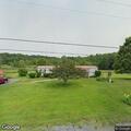 Person experiencing back pain at Birch Run Road
