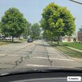 Single-vehicle crash with trapped driver and smoke