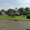 Caller reports unknown person outside home