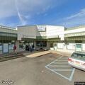 Smoke reported behind commercial building