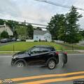 Car carrier stuck under bridge on Franklin Turnpike